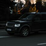 a black suv on a road