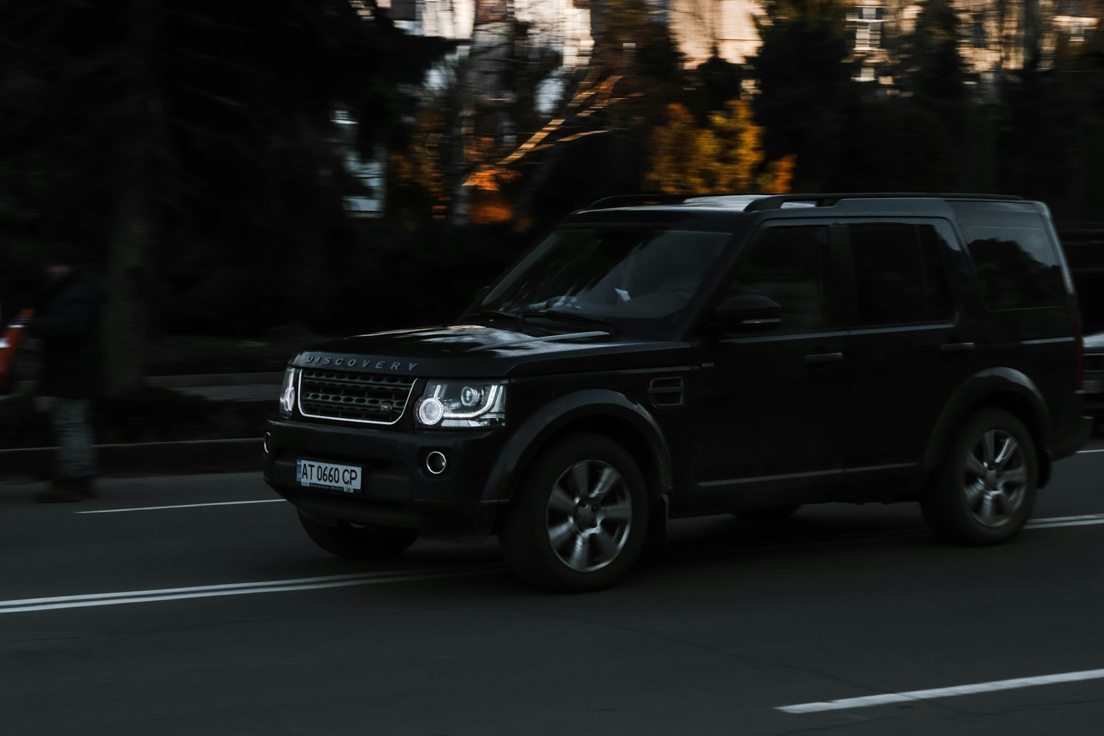 a black suv on a road